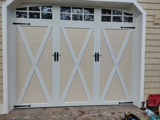 white garage door with cross